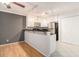 Contemporary kitchen featuring stainless steel appliances, granite countertops, and stylish lighting at 1445 Monroe Ne Dr # F10, Atlanta, GA 30324