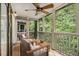 Enjoy nature in this screened porch, a tranquil space perfect for relaxation at 1445 Monroe Ne Dr # F10, Atlanta, GA 30324