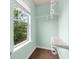 Closet with wood floor, a window with view of trees, and white wire shelving at 2166 Villa Spring Ct, Dacula, GA 30019