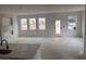 Open living room featuring bright windows at 3102 Marbella Cir # 1, Kennesaw, GA 30152