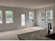 Open living room featuring bright windows at 3102 Marbella Cir # 1, Kennesaw, GA 30152