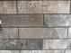 A full-frame close-up of a grey and mottled subway-style tile at 3102 Marbella Cir # 1, Kennesaw, GA 30152