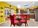 Eat-in kitchen featuring modern lighting, stainless appliances, and a large island at 7027 Walham Grv, Duluth, GA 30097