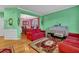 Spacious living room that includes views of the dining room that has great natural light at 7027 Walham Grv, Duluth, GA 30097