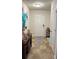 Inviting entryway with neutral tones, stylish decor, and convenient coat closet at 2080 Belmont Cir, Conyers, GA 30012