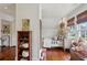 Bright bedroom showing hardwood floors, shiplap ceiling, and natural light at 27 Sessions Nw St, Marietta, GA 30060