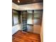 Walk-in closet boasts custom shelving and plenty of storage space for clothes and shoes at 27 Sessions Nw St, Marietta, GA 30060