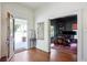Open foyer leading to an office, featuring hardwood floors and an inviting entryway at 27 Sessions Nw St, Marietta, GA 30060