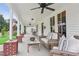 Inviting front porch with comfortable seating, offering a relaxing outdoor space with nice columns at 27 Sessions Nw St, Marietta, GA 30060