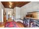 Bright laundry room featuring a wood ceiling, washer and dryer, and built-in cabinets for lots of storage at 27 Sessions Nw St, Marietta, GA 30060