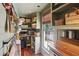 Walk-in pantry offering lots of storage, open shelving, a window with shades and lots of counterspace at 27 Sessions Nw St, Marietta, GA 30060
