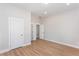 Spacious room with hardwood floors, neutral paint, and multiple closets at 3286 Bachelor Street, East Point, GA 30344