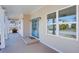 Inviting porch with a bright blue door and views of the surrounding neighborhood at 3286 Bachelor Street, East Point, GA 30344