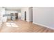 Bright, open-concept kitchen with stainless appliances, central island, and hardwood floors at 3286 Bachelor Street, East Point, GA 30344