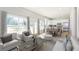 Open-concept living area featuring a modern kitchen, dining space, and cozy seating at 3286 Bachelor Street, East Point, GA 30344