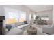 Bright open floor plan with large windows, comfortable seating, and elegant decor at 3286 Bachelor Street, East Point, GA 30344