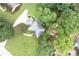 Aerial view of home with mature trees, large well manicured lawn and long driveway at 3589 Stone Ridge Trl, Douglasville, GA 30134