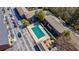 Aerial shot of a well-maintained community pool and convenient parking near residential buildings at 4282 Roswell Ne Rd # G1, Atlanta, GA 30342