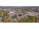 Picturesque aerial view of a residential community with lush greenery and cityscape in the background at 4282 Roswell Ne Rd # G1, Atlanta, GA 30342