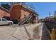 Brick apartment building with outdoor access staircase, and ample parking at 4282 Roswell Ne Rd # G1, Atlanta, GA 30342
