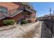 Brick apartment building with exterior staircases and well-maintained landscaping at 4282 Roswell Ne Rd # G1, Atlanta, GA 30342