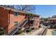 Building exterior with stairways leading to balconies, showcasing outdoor living at 4282 Roswell Ne Rd # G1, Atlanta, GA 30342