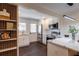 Bright kitchen with stainless appliances, stylish breakfast bar seating and view to an accent shelving unit at 4282 Roswell Ne Rd # G1, Atlanta, GA 30342