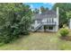 View of the backyard featuring a deck and lush green lawn at 4815 Rapids Nw Cir, Acworth, GA 30102