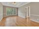 Spacious bedroom with tray ceilings and large window at 4815 Rapids Nw Cir, Acworth, GA 30102