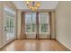 Dining area featuring hardwood floors and a door leading outside at 4815 Rapids Nw Cir, Acworth, GA 30102