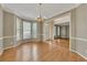 Formal dining room with view into foyer and living room, featuring hardwood floors at 4815 Rapids Nw Cir, Acworth, GA 30102
