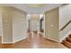 Spacious foyer with view to living and dining room, featuring hardwood floors at 4815 Rapids Nw Cir, Acworth, GA 30102