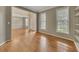 Living room with hardwood floors and view into the foyer and dining room at 4815 Rapids Nw Cir, Acworth, GA 30102