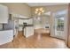 Open floor plan featuring kitchen, living room with fireplace, and door to back porch at 4815 Rapids Nw Cir, Acworth, GA 30102