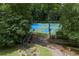 Photo shows neighborhood tennis and pickleball courts with lush trees at 4815 Rapids Nw Cir, Acworth, GA 30102