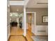 Elegant foyer with hardwood floors leading to the living room and kitchen at 1921 Northbrooke Ln, Dunwoody, GA 30338