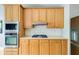 Modern kitchen with stainless steel appliances and built-in oven at 1921 Northbrooke Ln, Dunwoody, GA 30338