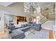 Spacious living room with view of stairs and connected kitchen area at 1921 Northbrooke Ln, Dunwoody, GA 30338