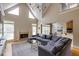 Spacious living room featuring a fireplace and an open floor plan at 1921 Northbrooke Ln, Dunwoody, GA 30338