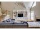 Comfortable living room showcasing a built-in entertainment center and staircase at 1921 Northbrooke Ln, Dunwoody, GA 30338
