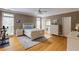 Spacious main bedroom featuring hardwood floors, a ceiling fan, and a serene ambiance at 1921 Northbrooke Ln, Dunwoody, GA 30338