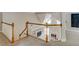 View of staircase overlooking an open-concept living room with high ceilings and lots of natural light at 1921 Northbrooke Ln, Dunwoody, GA 30338