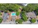 An aerial view shows the community pool, lake, and parking near the property at 2214 Lake Pointe Cir, Roswell, GA 30075