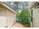 Balcony view to surrounding trees and lake at 2214 Lake Pointe Cir, Roswell, GA 30075