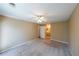 Bright and spacious bedroom features neutral colors and a ceiling fan at 2214 Lake Pointe Cir, Roswell, GA 30075