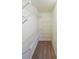 Walk-in closet with multiple wire shelves for ample storage in this well-appointed home at 2214 Lake Pointe Cir, Roswell, GA 30075
