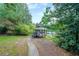 Charming gazebo overlooking a serene lake, perfect for relaxation at 2214 Lake Pointe Cir, Roswell, GA 30075