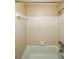 Clean, tiled shower and tub combination with updated fixtures at 2214 Lake Pointe Cir, Roswell, GA 30075