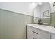 Bathroom features vanity with new sink, faucet, and a stylish framed mirror at 2711 Brookefield Nw Ln, Kennesaw, GA 30152