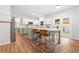 Stylish kitchen with a center island and bar stool seating, and views of the backyard at 2711 Brookefield Nw Ln, Kennesaw, GA 30152